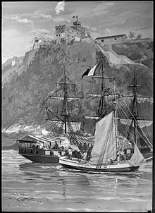 Two ships close together in a harbor with a stone fort high on a mountaintop overlooking them