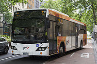Transdev Melbourne number 972 (8253AO) Custom Coaches bodied Scania in PTV livery on route 250 in Queen St, December 2013.jpg