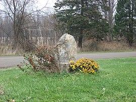 Monument on Redwood Road at the Michigan border