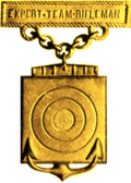 Former US Navy Expert Team Rifleman Badge.png