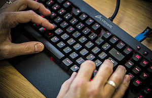 Operating a Computer Keyboard MOD 45158111.jpg