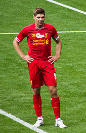 Garrard in an all red kit with white boots