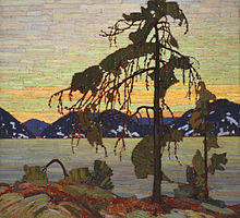 Oil on canvas painting of a tree dominating its rocky landscape during a sunset