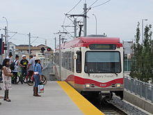 Calgary LRV 2207 leading train into Saddletowne station (2013).jpg