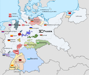 A colour-coded map of Germany in the early 1930s showing the individual German states and independent cities. The largest states of Prussia and Bavaria are coloured in light grey and light blue respectively.