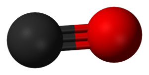 A carbon atom (shown as a grey ball) tripled bonded to an oxygen atom (shown as a red ball).