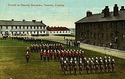 Postcard of Parade at Stanley Barracks, 1910.jpg
