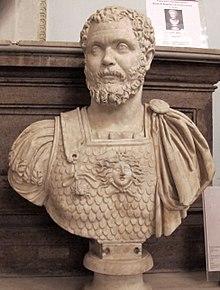 White statue of bearded man in military attire