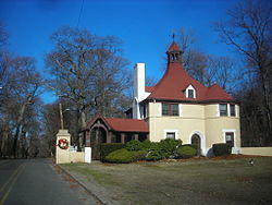 The Belle Terre Gatehouse, a beaux arts structure dating to the first decade of the 1900s
