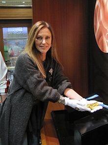 Former U.S. Olympian Peggy Fleming holds a Gold at the Pavilion.jpg