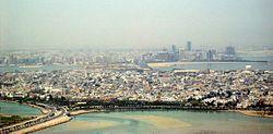 View of Muharraq with the skyline of Manama in the background