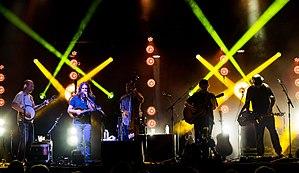 From left to right: Michael Bont (banjo/vocals), Paul Hoffman (mandolin/vocals), Mike Devol (bass/vocals), David Bruzza (guitar/vocals), Anders Beck (dobro).