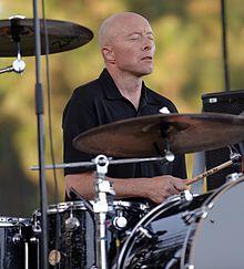 Augustyniak performing with 10,000 Maniacs at Pittsford Park in Lake Forest in 2015