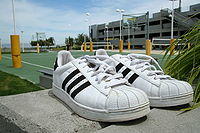 Adidas Superstar shoes pair.jpg