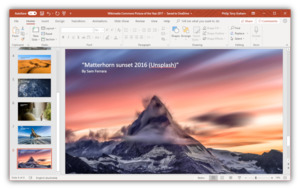 A photo presentation being created and edited in PowerPoint, running on Windows 10