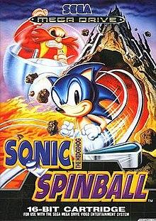The game's European cover art. The artwork shows Sonic the Hedgehog running in the foreground, while series antagonist Doctor Robotnik is angrily chasing him on a floating pod. The background shows the volcanic Mt Mobius erupting. Pinball flippers can be seen at the bottom.