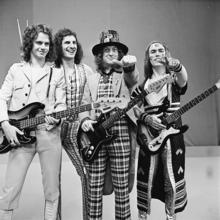 Slade in November 1973; left to right: Jim Lea, Don Powell, Noddy Holder, and Dave Hill