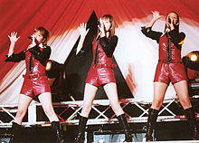 Coconuts Musume in concert, 2002. From left to right, Mika Todd, Ayaka Kimura, Lehua Sandbo.