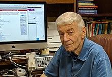 Stephen Barrett seated at desk crop.jpg