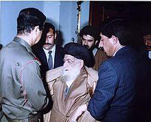 Islamic cleric with Saddam Hussein