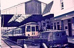 Rear oil lamp being placed on a Class 103 at Kingswear station (1972).jpg