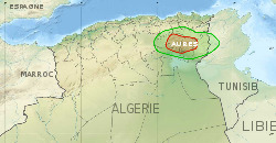 A map of northern Algeria showing the location of the Aurès region in red and the greater region in green