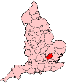 A small county slightly to the south and east of the centre of the country, and completely bounded by other counties.