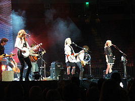 The band performing onstage