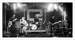 Klee performing at the 2010 "At the Edge of the Sea" festival in Brighton, England