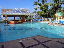 The main pool at Sandals, Negril (171419342).jpg