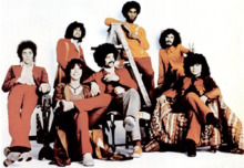 Santana in 1971. Left to right: Neal Schon, Gregg Rolie, Michael Shrieve, Michael Carabello, David Brown, Carlos Santana, José "Chepito" Areas.
