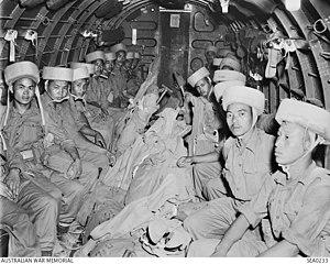 Indian paratroops waiting to jump over Burma 1945.jpg