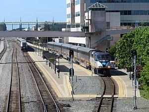 Two trains at Emeryville station, June 2018.JPG