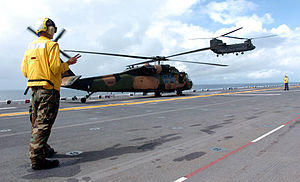 US Navy 050612-N-8146B-001 An Australian Army S70A-9 Black Hawk and a CH-47D Chinook assigned to Australian 5th Aviation Regiment, conduct flight operations from the flight deck of the amphibious assault ship USS Boxer (LHD 4).jpg