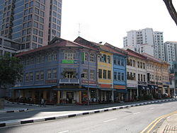 Eateries in pre-war shophouses along River Valley Road offer local delicacies. Note: A number of these buildings have been demolished to make way for a new condominium.