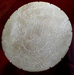 A stone palette from the Moundville Site, the back is concave and was used as a bowl for mixing paint