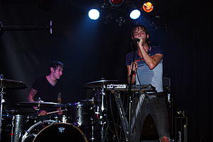 These Arms Are Snakes performing live in Barcelona. Visible are vocalist Steve Snere and drummer Chris Common.