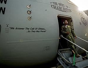 U.S. Air Force Airman 1st Class Trae Williams, a loadmaster with the 16th Airlift Squadron, exits a C-17 Globemaster III aircraft July 30, 2013, at Joint Base Charleston, S.C 130730-F-LR006-071.jpg