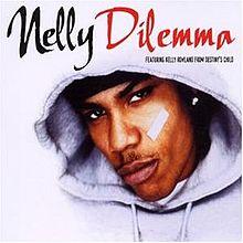 Nelly is seen wearing tape under his left eye, and a white hood that blends in with the white background. The song title and artist are displayed above him.