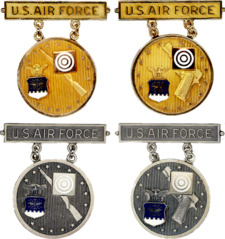 Former USAF Gold and Silver Elementary EIC Badges.png