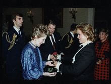 Jill Whelan presents rose to Mrs. Reagan.jpg