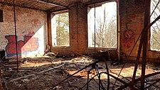 A gutted and burnt room in the "Memorial Hall" building.
