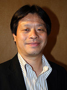 A smiling Yoshinori Kitase