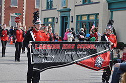 Lansing High School band marching in the 2015 Veterans Day Parade