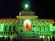 image of the temple at night illuminated with green light