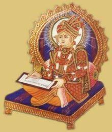 Lord Swaminarayan writing the Shikshapatri.jpg