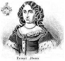 A lady who had thick hair, decorated with pearls