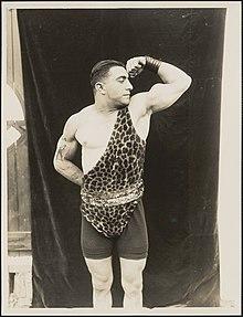 A circus strongman circa 1916.