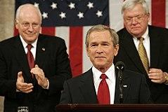 President George W. Bush alongside Dick Cheney and Dennis Hastert presents his fourth State of the Union address at the U.S. Capitol, February 2, 2005.jpg