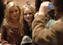 Krakowski and Wood posing for a photo